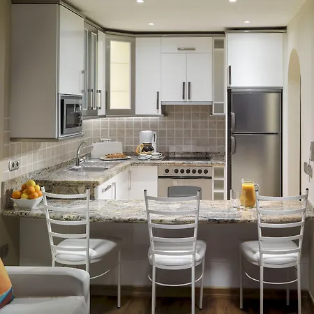 丽晶图维斯卡斯公寓加套房